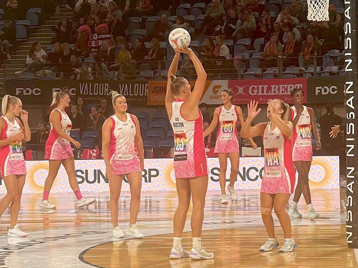 Adelaide Thunderbirds players warming up at half-time