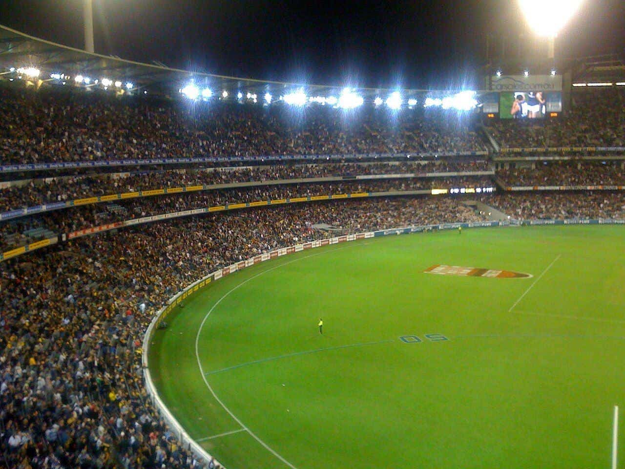 Richmond and Carlton players contest the ball at the MCG